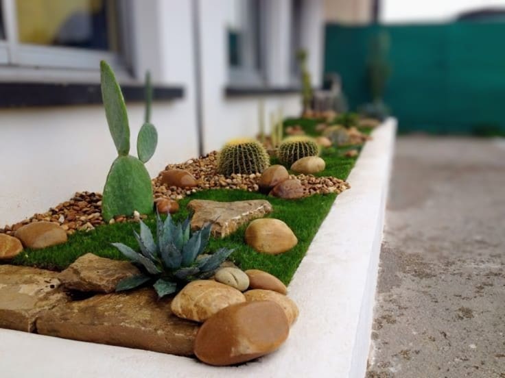 desain taman dengan elemen batu alam